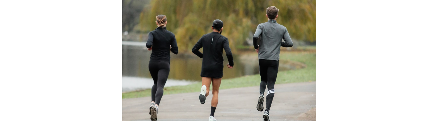 three people running