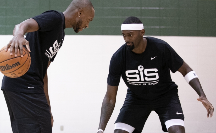 Bobby and Khris playing basketball