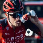 INEOS rider taking drink whilst on bike