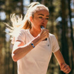 Elite female runner with SiS GO Gel