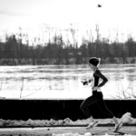 Long distance runner training in the snow