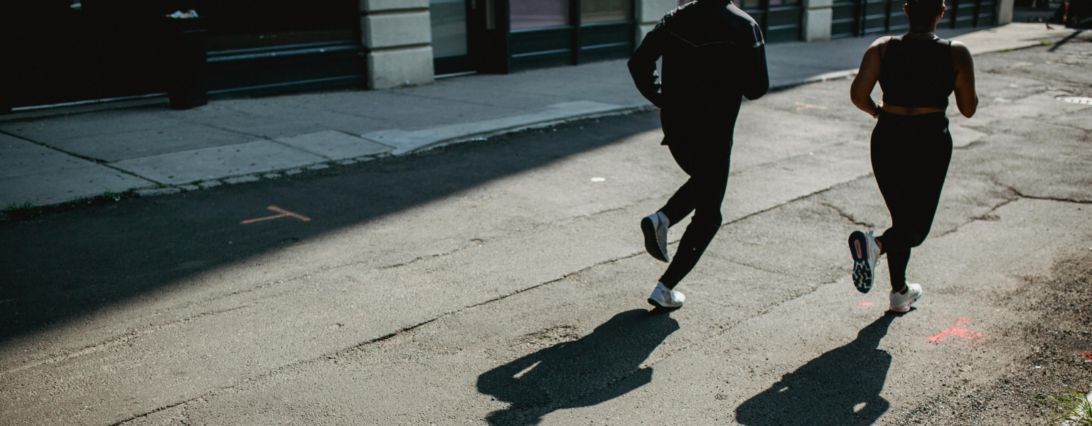 Runners training on a road for an upcoming race