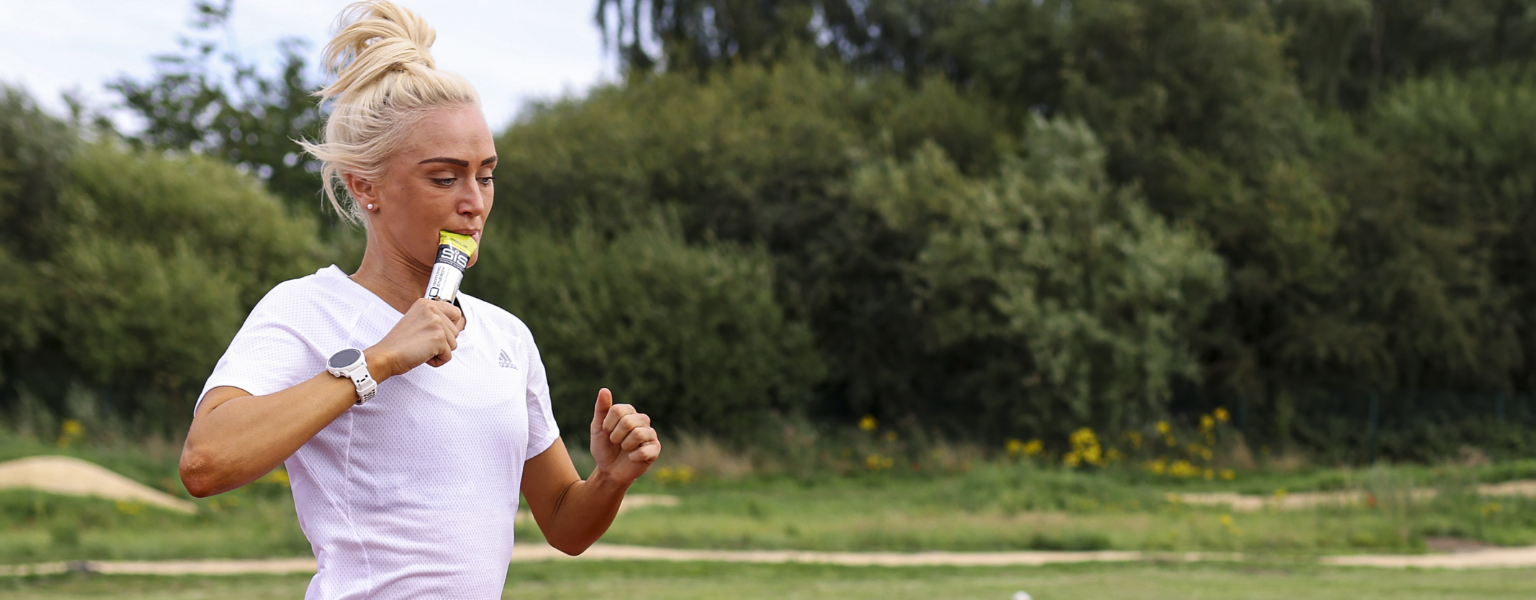 Woman running with a SiS GO Gel