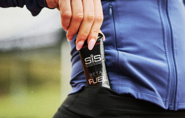Runner take a BETA Fuel Strawberry & Lime flavour gel out of their pocket