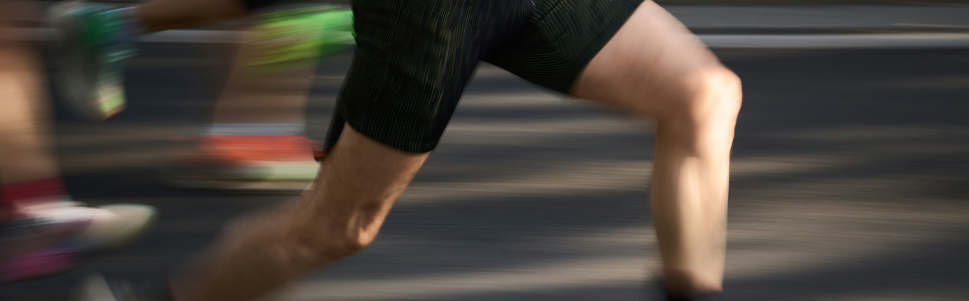 Blurred shot of runner's legs during a marathon