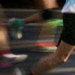Blurred shot of runner's legs during a marathon